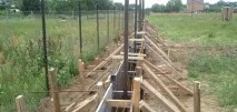 Як зробити паркан із цегляними стовпами на стрічковому фундаменті етапи робіт фундаменті