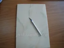 Вирізання з паперу Сніговика багато