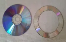 Декоративне підхоплення для штор із старих CD-дисків. декоративне
