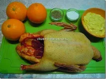 Качка з апельсинами качка