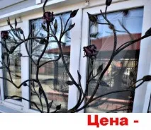 головна