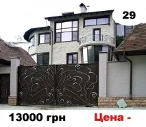 головна