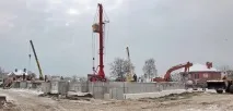 збудувати