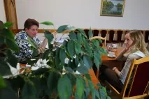 мене
