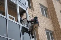 Утеплення фасадного скління балкона фасадного