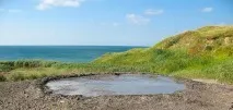Лікувальний грязьовий вулкан в Кучугурах де знаходиться і чим корисний Готель Лаванда Азов кучугурах