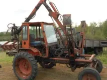 Грейферний навантажувач Т-16 у сільському господарстві навантажувач