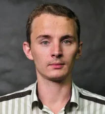 який