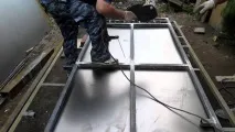 Ворота для гаража металеві розстібні переваги, недоліки, комплектація ворота