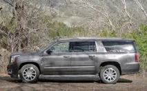 Огляд американського позашляховика GMC Yukon Denali 2015 з фото екстер’єру, інтер’єру, докладними. огляд