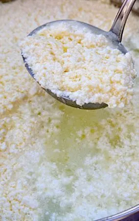 како