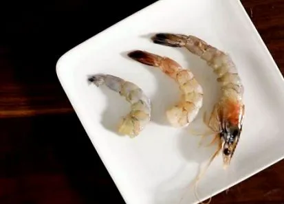 како