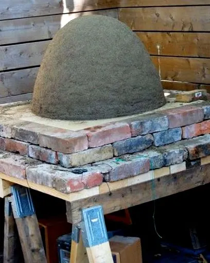 како