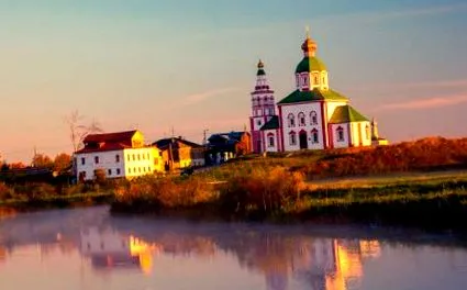 русија