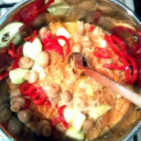 како
