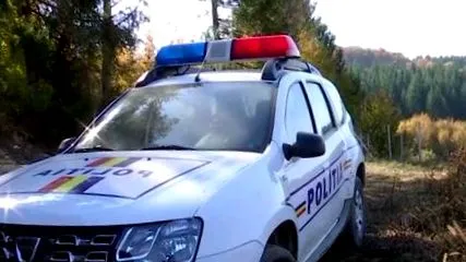 žena