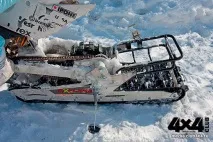 Мотоцикл з лижею та гусеницею гусеницею