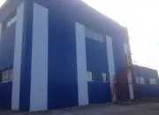 Обшивка фасаду профнастилом в Рязані будівлі