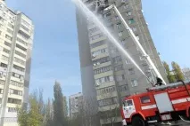 будинках