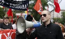 Удальцов після обшуків занедужав і знову не з’явиться до суду у справі про побої - За кордоном обшуків