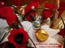 Букет із цукерок «Лілії та троянди» лілії