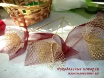 Букет із цукерок «Лілії та троянди» букета