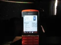 Nokia Asha 300 - Огляд червоного та частково сенсорного несмартфону огляд
