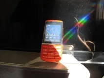 Nokia Asha 300 - Огляд червоного та частково сенсорного несмартфону nokia