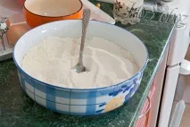 американський