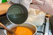 американський