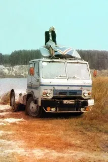 микола