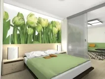 біля