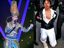 позначені