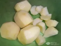 Рецепт Курка запечена з картоплею, У пакеті картоплею