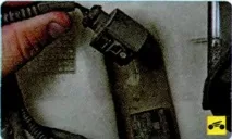Заміна електронасосів омивачів вітрового скла, скла задніх дверей та фар Skoda Octavia заміна