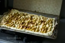 край