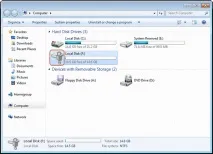 Як приховати диск зарезервований системою Windows 7 ручним способом приховати
