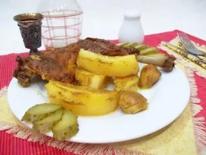 Курячі стегна в духовці - з картоплею і часником (духовці) Курячі стегна в духовці - з картоплею і часником