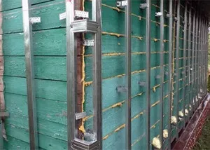 Обшивка дерев'яного будинку сайдингом своїми руками, інструкція монтажу з фото і відео