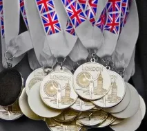 Скільки золота у золотій олімпійській медалі Вага олімпійської медалі золота