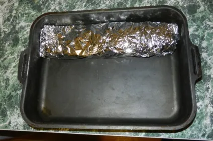 Сібас запечений в духовці з лимонами в фользі (запечений) Сібас запечений в духовці з лимонами в фользі