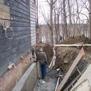 Як зміцнити фундамент старого дерев'яного та цегляного будинку - легка справа