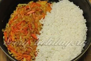 Свинячі реберця тушковані з рисом