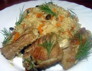 Свинячі реберця з рисом