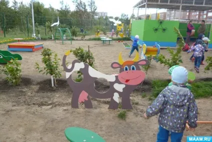 Прикраса ділянки з дерева «корівка і жираф» (для педагогів) Прикраса ділянки з дерева «корівка і жираф»