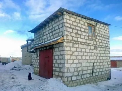 Двоповерховий гараж фото