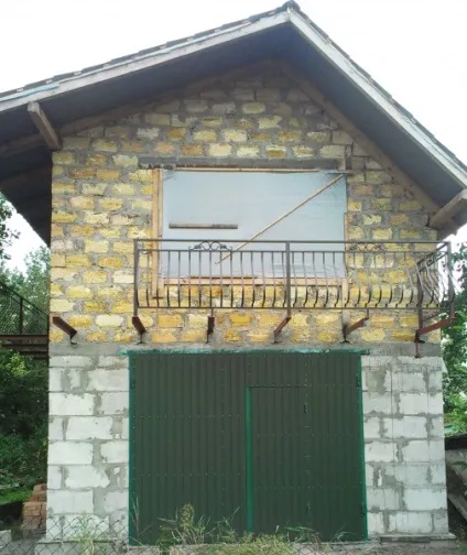 Двоповерховий гараж фото