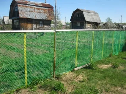 Пластикова сітка для огорожі (паркану) своїми руками (забору) Пластикова сітка для огорожі (паркану) своїми руками