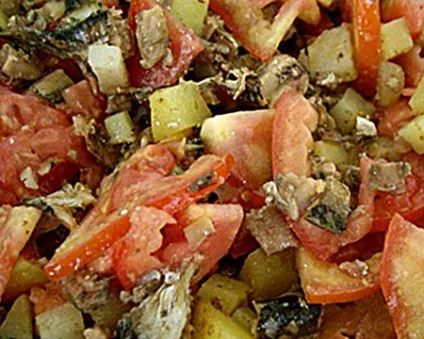 Салат зі шпротами і помідорами покроковий рецепт з фото