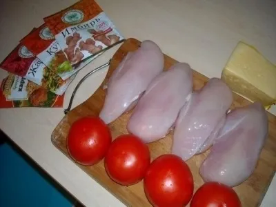 Куряче філе під сиром з помідорами (помідорами) Куряче філе під сиром з помідорами